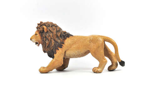 Plastic Toy Lion on White Background.の写真素材