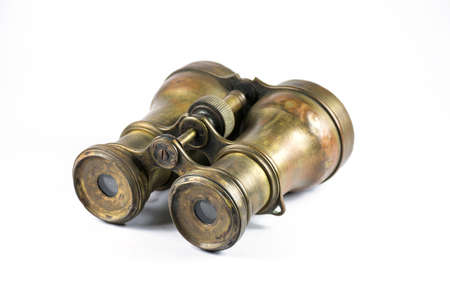 Antique binoculars on a white backgroundの写真素材