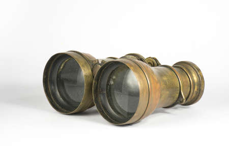 Antique binoculars on a white backgroundの写真素材