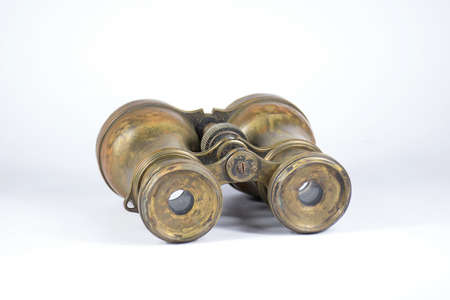 Antique binoculars on a white backgroundの写真素材
