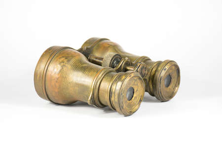 Antique binoculars on a white backgroundの写真素材