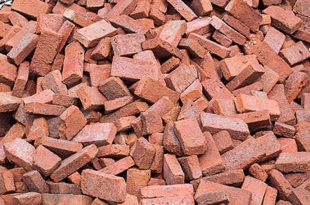 pile of red bricks for constructionの写真素材