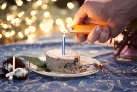 Lighting the Birthday Candleの写真素材