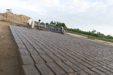 Asia India Tamil Nadu Sengal Soolai village June 2014 All people of the village work 12 hours a day 6 days per week doing hand made bricks for buildings and house.のeditorial素材