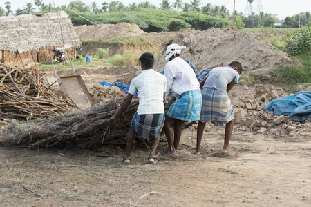 Asia India Tamil Nadu Sengal Soolai village June 2014 All people of the village work 12 hours a day 6 days per week doing hand made bricks for buildings and house.のeditorial素材