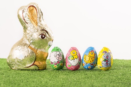 Group of colorful candy Easter eggs wrapped in foil