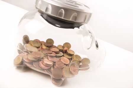 Coins and bills Euro saving crisis economy moneyの写真素材