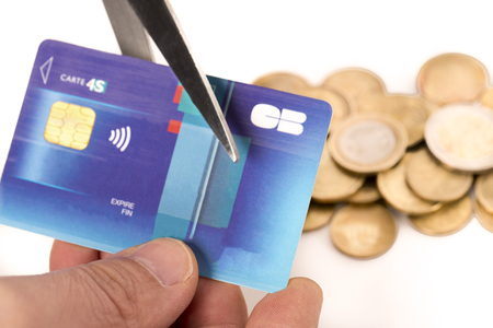 Danger finance situation conceptual. Economic crisis. Coins  credit cardの写真素材