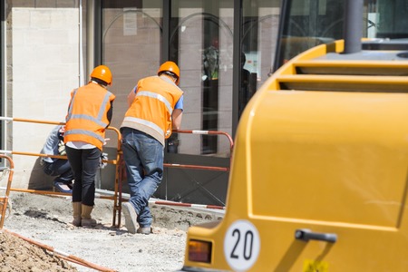 workers working for upgrade to residential street.