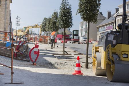 workers working for upgrade to residential street.