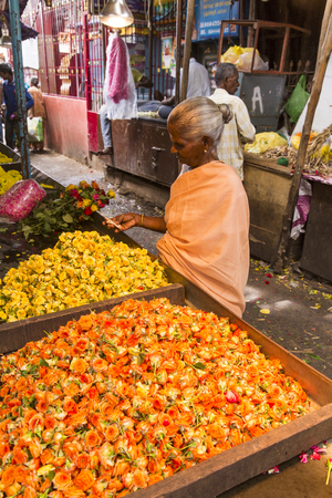 Illustrative documentary. Pondicherry, India, February 21, 2014. Sales of fruits vegetables and flowers in the main market, daily market.のeditorial素材