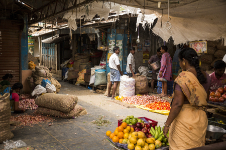 Illustrative documentary. Pondicherry, India, February 21, 2014. Sales of fruits vegetables and flowers in the main market, daily market.のeditorial素材