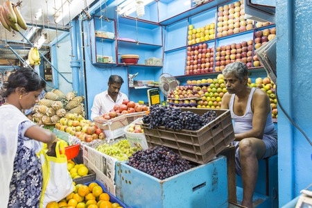 Illustrative documentary. Pondicherry, India, February 21, 2014. Sales of fruits vegetables and flowers in the main market, daily market.のeditorial素材