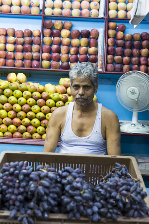 Illustrative documentary. Pondicherry, India, February 21, 2014. Sales of fruits vegetables and flowers in the main market, daily market.のeditorial素材