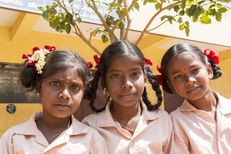 Pondichery, Tamil Nadu, India - March 03, 2014. In the school, portraits of indian boys and girls, serious, happy sad smiling differents feelingsのeditorial素材
