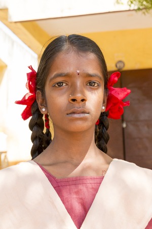 Pondichery, Tamil Nadu, India - March 03, 2014. In the school, portraits of indian boys and girls, serious, happy sad smiling differents feelingsのeditorial素材