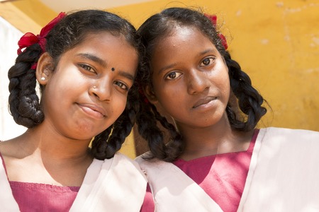 Pondichery, Tamil Nadu, India - March 03, 2014. In the school, portraits of indian boys and girls, serious, happy sad smiling differents feelingsのeditorial素材