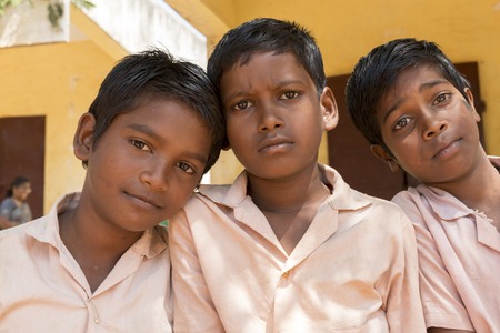 Pondichery, Tamil Nadu, India - March 03, 2014. In the school, portraits of indian boys and girls, serious, happy sad smiling differents feelingsのeditorial素材