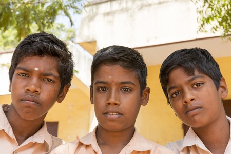 Pondichery, Tamil Nadu, India - March 03, 2014. In the school, portraits of indian boys and girls, serious, happy sad smiling differents feelingsのeditorial素材