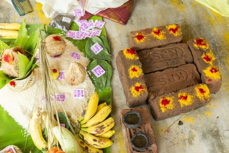 Documentary image. Pondichery, Tamil Nadu, India. May 27, 2014. Puja Thila homa with french lady and priest, brahman to pray about died man.のeditorial素材