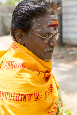 Documentary image. Pondichery, Tamil Nadu, India. May 27, 2014. Puja Thila homa with french lady and priest, brahman to pray about died man.のeditorial素材