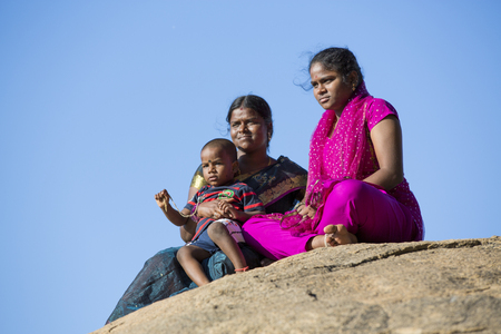Illustrative image. Pondichery, Tamil Nadu, India. June 15, 2014. Family meeting in the street in park outdoorのeditorial素材