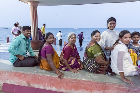 Illustrative image. Pondichery, Tamil Nadu, India. June 15, 2014. Family meeting in the street in park outdoorのeditorial素材