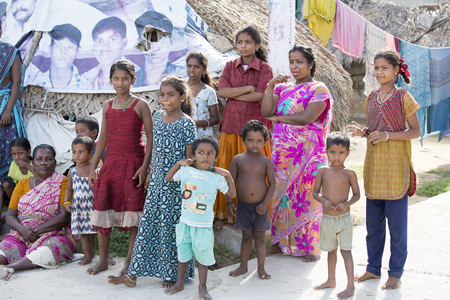 Illustrative image. Pondichery, Tamil Nadu, India. June 15, 2014. Family meeting in the street in park outdoorのeditorial素材