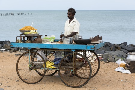 Illustrative image. Pondicgery, Tamil Nadu, India - Marsh 10., 2014. Shop of food, restaurant in the street itinerant trade small merchantのeditorial素材
