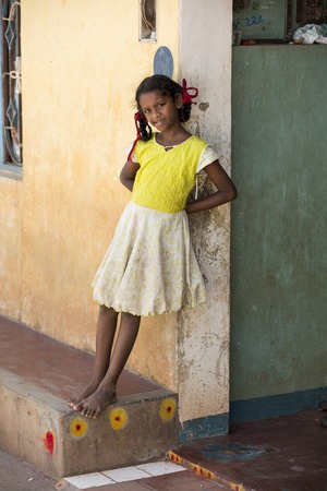 Illustrative image. Pondicherry, Tamil Nadu, India - April 21, 2014. Poor child with sad feeling, in the streetのeditorial素材