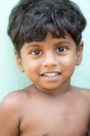 Illustrative image. Pondicherry, Tamil Nadu, India - Marsh 07, 2014. Poor child with smile feeling, in the streetのeditorial素材