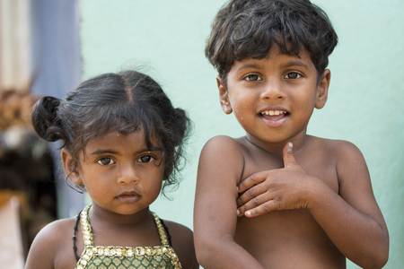 Illustrative image. Pondicherry, Tamil Nadu, India - Marsh 07, 2014. Poor child with smile feeling, in the streetのeditorial素材