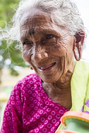 Illustrative image. Pondicherry, Tamil Nadu, India - April 14, 2014. Portrait of senior indian woman...