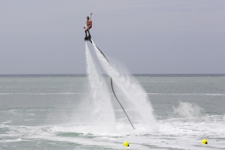 Illustrative editorial image. a fly board rider at seaのeditorial素材