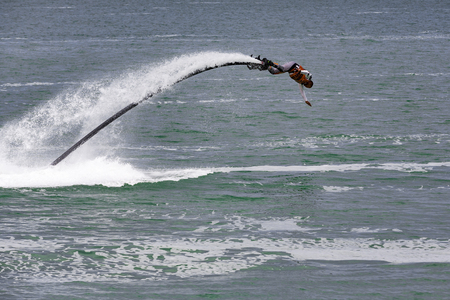 Illustrative editorial image. a fly board rider at seaのeditorial素材