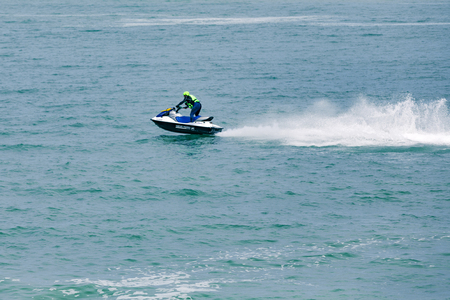 Veulette sur mer, Normandy, France - May 28, 2017. Unidentified competitors are riding jet ski boat for a race, championship France. Jet in motion