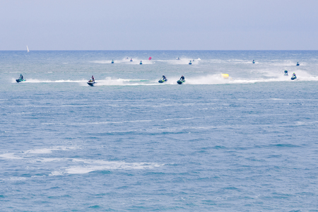 Veulette sur mer, Normandy, France - May 28, 2017. Unidentified competitors are riding jet ski boat for a race, championship France. Jet in motionのeditorial素材