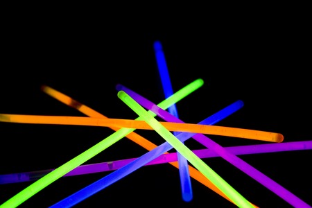 Glow sticks neon light fluorescent on back background. variation of different colored chem lightsの写真素材