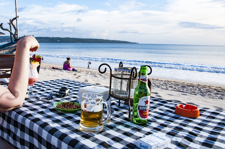 Bali, Indonesia - July 27 2013. table on the beach with sea viewのeditorial素材