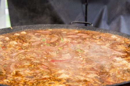 Jumbalaya, Louisiana meat, in a big paella pan. Close upの写真素材