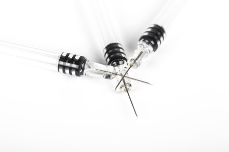 Medical Syringes closeup on white background, for treatmentの写真素材
