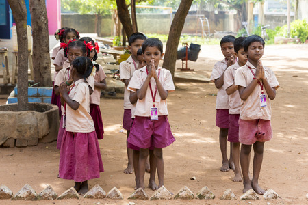 PONDICHERY, PUDUCHERY, INDIA - SSEPTEMBER 04, 2017. School parade of each monday morning, with children students in uniforms. They walk, sing and pray before going in the classrooms.のeditorial素材