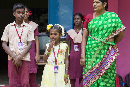 PONDICHERY, PUDUCHERY, INDIA - SSEPTEMBER 04, 2017. School parade of each monday morning, with children students in uniforms. They walk, sing and pray before going in the classrooms.のeditorial素材