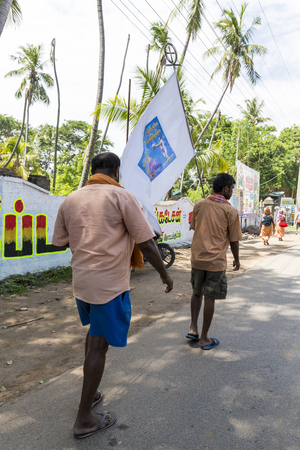 PONDICHERY, PUDUCHERY, INDIA - AUGUST 28, 2017. Unidentified christians, catholics, hinduists people, with orange dress, pilgrims walk from chennai to Velanganni, for annual pilgrimage at the church of Velankanni. They walk more than 250 kilometers.のeditorial素材