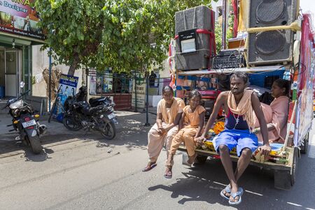 PONDICHERY, PUDUCHERY, INDIA - AUGUST 28, 2017. Unidentified christians, catholics, hinduists people, with orange dress, pilgrims walk from chennai to Velanganni, for annual pilgrimage at the church of Velankanni. They walk more than 250 kilometers.のeditorial素材
