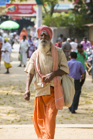 TIRUVANNAMALI, TAMIL NADU, INDIA - MARCH Circa, 2018 . Portrait Sadhu at Ashram Ramana Maharshi. Sadhu is a holy man, who have chosen to live an ascetic life and focus on the spiritual practice of Hinduism. Sage, Moksha, Maya, caste, Shiva, Vishnou, gymnoのeditorial素材
