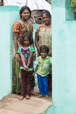 PONDICHERY, PUDUCHERRY, TAMIL NADU, INDIA - SEPTEMBER CIRCA, 2017. Portrait of a unidentified happy woman with children outdoorsのeditorial素材
