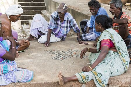 PONDICHERY, PUDUCHERRY, TAMIL NADU, INDIA - SEPTEMBER CIRCA, 2017. Group of unidentified men and...
