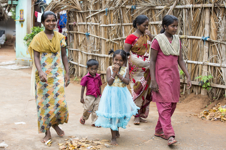 PONDICHERY, PUDUCHERRY, TAMIL NADU, INDIA - SEPTEMBER CIRCA, 2017. Unidentified rural people in front of their house at village, An Indian rural scene.のeditorial素材