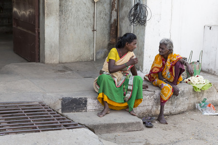 PONDICHERY, PUDUCHERRY, TAMIL NADU, INDIA - SEPTEMBER CIRCA, 2017. Unidentified rural people in front of their house at village, An Indian rural scene.のeditorial素材